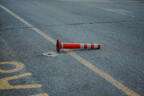 kuala lumpur red and white traffic cone street